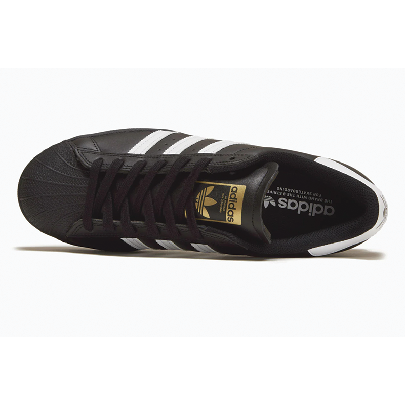 Adidas superstar black with gold stripes hotsell